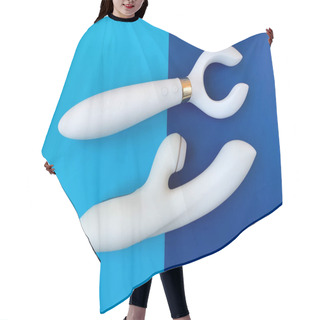 Personality  Sex Toys. Two White Vibrators On A Blue Background. Useful For Adult, Sex Shop Hair Cutting Cape