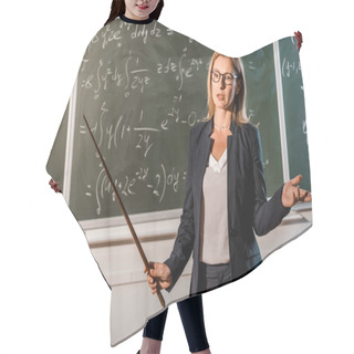 Personality  Female Teacher In Formal Wear With Wooden Pointer Explaining Mathematical Equations In Classroom Hair Cutting Cape