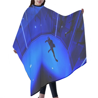 Personality  A Man Flier Doing Stunts In An Indoor Wind Tunnel Hair Cutting Cape
