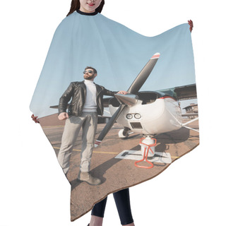 Personality  Full Length Of Bearded Pilot In Leather Jacket And Sunglasses Standing Near Aircraft  Hair Cutting Cape