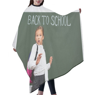 Personality  Shocked Schoolgirl With Backpack Looking At Camera Near Chalkboard With Back To School Inscription Hair Cutting Cape