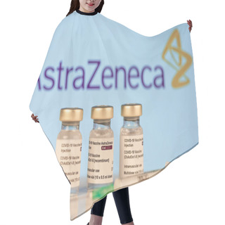 Personality  San Sebastian, Gipuzkoa, Spain; 03 February 2021.Three Covid-19  Astrazeneca Vaccine Vials With Astrazeneca Logotype Background To Inject Medical Professionals And People At Risk. SARS-CoV-2 Vaccination Treatment. Copy Space. Hair Cutting Cape