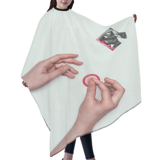Personality  Partial View Of Woman Holding Opened Condom In Hands Isolated On Grey Hair Cutting Cape