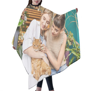 Personality  Two Women, A Loving Lesbian Couple, Sit Peacefully On A Porch With A Cat, Surrounded By Artistic Decor. Hair Cutting Cape