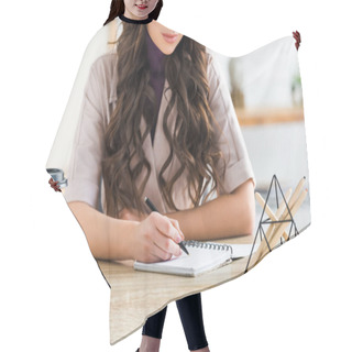 Personality  Cropped View Of Curly Girl Writing In Notebook Near Paper Cup  Hair Cutting Cape