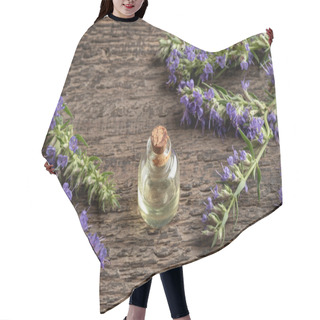 Personality  A Bottle Of Essential Oil With Fresh Blooming Hyssop Hair Cutting Cape