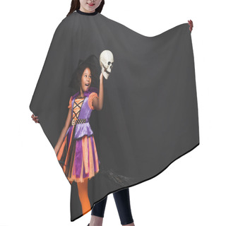 Personality  Excited African American Girl In Witch Halloween Costume On Top Of Broom Holding Skull Isolated On Black  Hair Cutting Cape