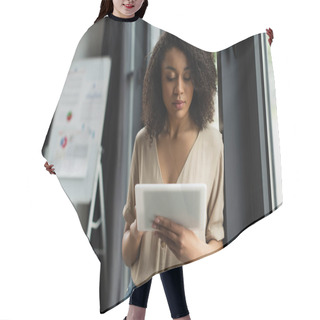 Personality  African American Woman In Casual Clothes Standing Near Window And Typing On Digital Tablet In Modern Office Hair Cutting Cape