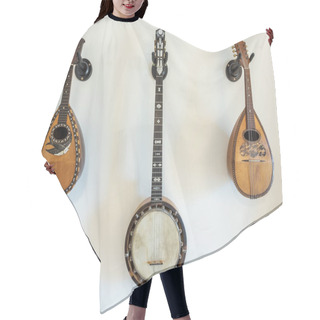Personality  Stringed Musical Instruments On The Wall. Inside Hair Cutting Cape