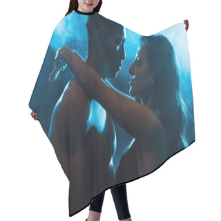 Personality  Side View Of Young Attractive Woman In Bra Hugging Sexy Muscular Mixed Race Man On Blue With Smoke  Hair Cutting Cape