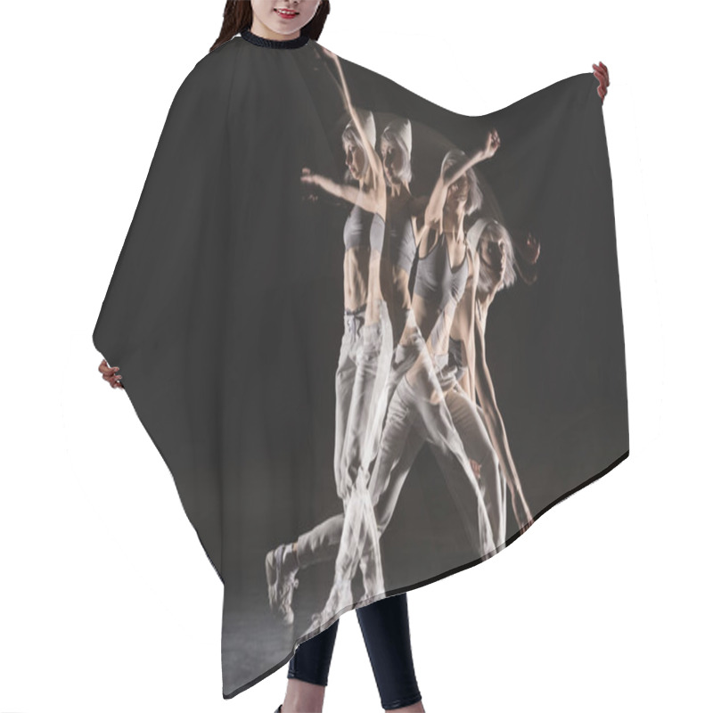 Personality  dancing woman in sports clothing hair cutting cape
