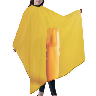 Personality  Sunscreen In Orange Bottle On Dark Yellow Background Hair Cutting Cape