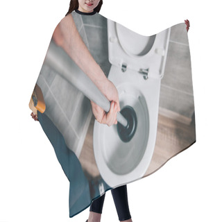 Personality  Cropped Shot Of Male Plumber Using Plunger And Cleaning Toilet In Bathroom  Hair Cutting Cape