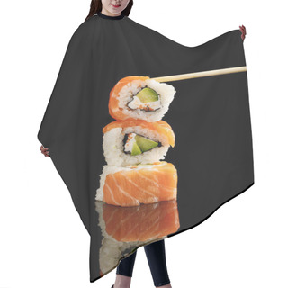 Personality  Chopstick Near Delicious Philadelphia Sushi With Avocado, Creamy Cheese, Salmon And Masago Caviar Isolated On Black With Reflection Hair Cutting Cape