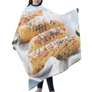 Personality  Close Up View Of Grilled Corn With Lime Slices On Baking Paper On Wooden Table  Hair Cutting Cape
