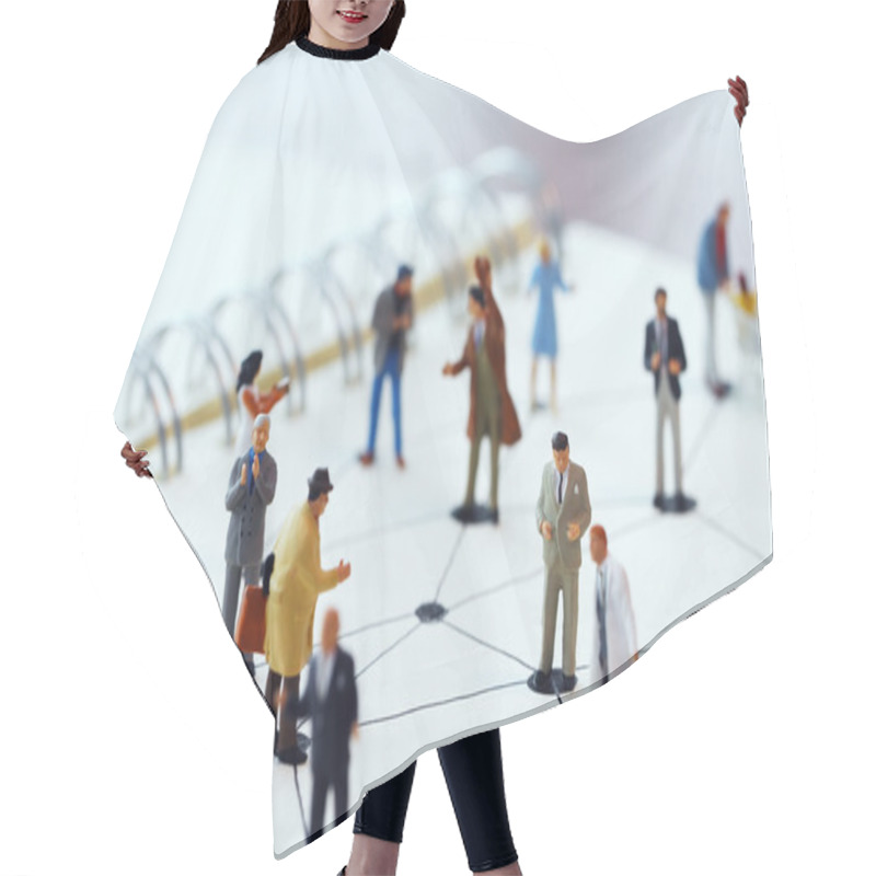 Personality  Close Up Of Miniature People With Social Network Diagram On Open Hair Cutting Cape