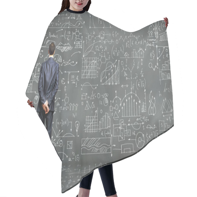 Personality  Business person against the blackboard hair cutting cape