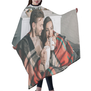 Personality  Happy Young Couple With Mugs Of Cocoa With Marshmallow Relaxing On Couch And Covering With Plaid Hair Cutting Cape