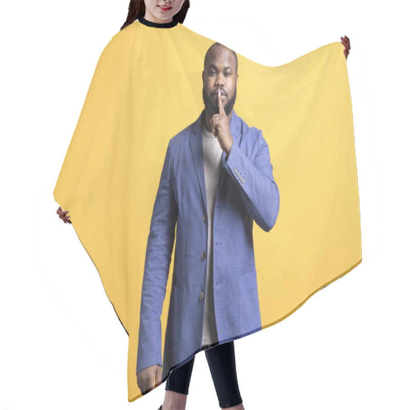 Personality  Annoyed African American Man Doing Shushing Hand Gesturing, Irritated By Noise, Having Negative Mood. Person Placing Finger On Lips, Doing Quiet Sign Gesture, Studio Background Hair Cutting Cape