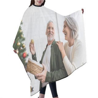 Personality  Positive Middle Aged Woman Hugging Husband Decorating Christmas Tree Hair Cutting Cape