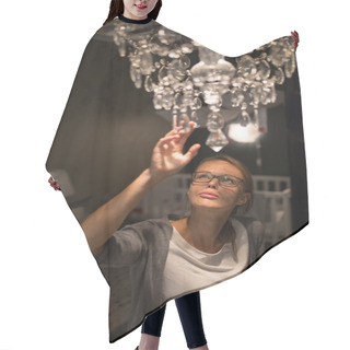 Personality  Pretty, Young Woman Choosing The Right Chandelier Hair Cutting Cape