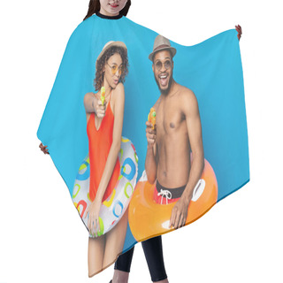 Personality  Black Couple With Inflatable Rings Shooting At Camera With Water Guns Hair Cutting Cape