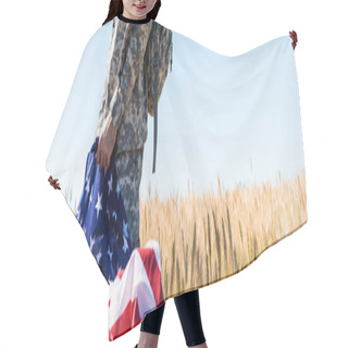 Personality  Panoramic Shot Of Patriotic Soldier In Military Uniform Holding American Flag While Standing In Field  Hair Cutting Cape