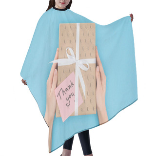 Personality  Cropped Person Holding Gift Box With Sticky Note With Thank You Lettering Isolated On Blue Background  Hair Cutting Cape