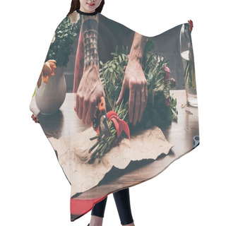 Personality  Cropped Image Of Florist With Tattoo On Hand Cutting Stalks With Pruner Hair Cutting Cape