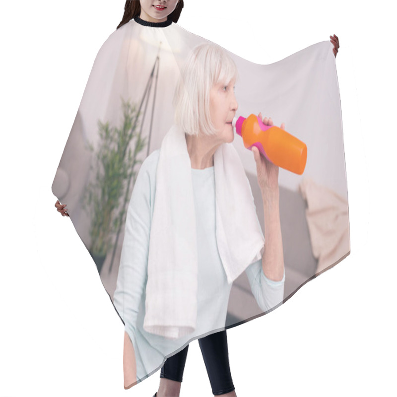 Personality  Pleasant Senior Woman Drinking Water After A Workout Hair Cutting Cape