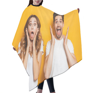Personality  Photo Of Excited Couple Man And Woman In Basic Clothing Shouting In Surprise Or Delight And Raising Arms Isolated Over Yellow Background Hair Cutting Cape