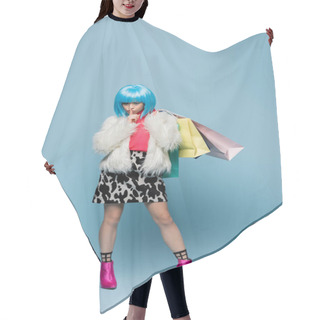 Personality  Asian Woman In Pop Art Style Holding Shopping Bags And Showing Secret Gesture On Blue Background Hair Cutting Cape