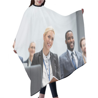 Personality  Cheerful Businesswoman With Paper Folder Sitting Near Multiethnic Colleagues During Seminar  Hair Cutting Cape