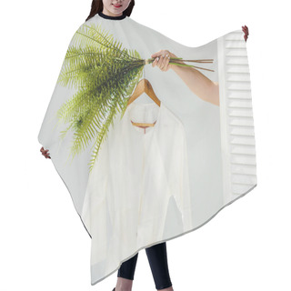 Personality  Close Up Of Female Hand Holding Hanger With White Dress And Green Plants Hair Cutting Cape