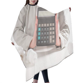Personality  Cropped View Of Woman Holding Calculator Near Lamps On White Background, Energy Efficiency Concept Hair Cutting Cape