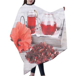 Personality  Hibiscus Tea In Glass Teapot And Flower On Color Napkin On Wooden Background Hair Cutting Cape
