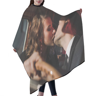 Personality  Selective Focus Of Couple Kissing In Retro Car  Hair Cutting Cape