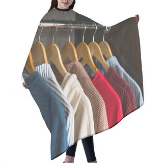 Personality  Hangers With Different Clothes In Wardrobe Closet. Hair Cutting Cape