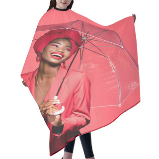 Personality  Happy African American Young Woman In Stylish Outfit And Turban Holding Umbrella Isolated On Red Hair Cutting Cape