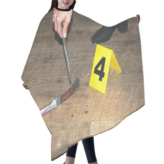 Personality  Cropped View Of Hand Examining Evidence At Crime Scene Hair Cutting Cape