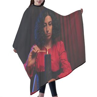 Personality  Young Oracle Lighting Aroma Stick Near Burning Candle On Dark Background With Red Drape Hair Cutting Cape