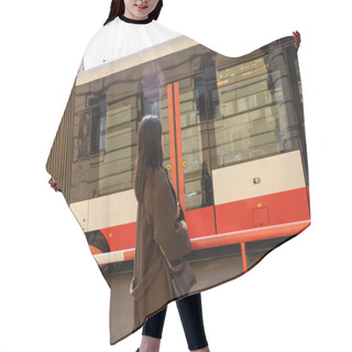 Personality  Young Brunette Woman In Coat Looking At Tram On Street In Prague  Hair Cutting Cape