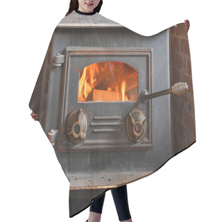 Personality  A Close Up Image Of An Old Fashioned Wood Burning Stove. Hair Cutting Cape