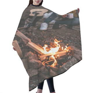 Personality  Cropped View Of Woman Putting Log In Burning Bonfire Hair Cutting Cape