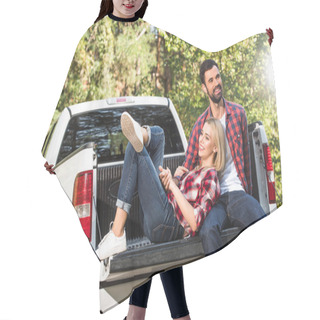 Personality  Smiling Young Woman Laying On Boyfriend Knees On Car Trunk Outdoors  Hair Cutting Cape