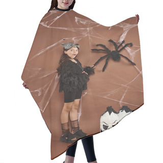 Personality  Surprised Preteen Girl In Black Outfit Touching Spider On Brown Backdrop With Cobweb, Halloween Hair Cutting Cape