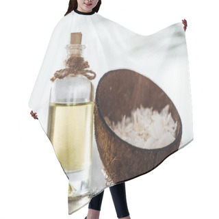Personality  Selective Focus Of Bottle With Coconut Oil Near Coconut Shell With Coconut Shavings Hair Cutting Cape