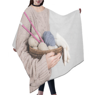 Personality  Cropped View Of Young Woman Holding Basket With Knitting Needles, Yarn And Gloves On White Background Hair Cutting Cape