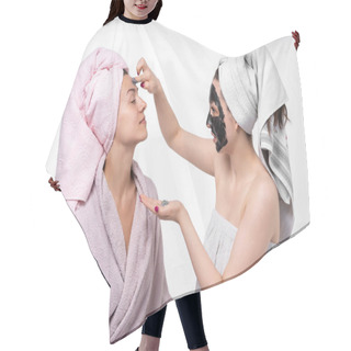 Personality  The Girl Puts Her Sister A Cosmetic Mask On Her Face. They Have Fun And Indulge In The Process. Empty Background, Great Mood. Facial Skin Care. Sisters. Hair Cutting Cape