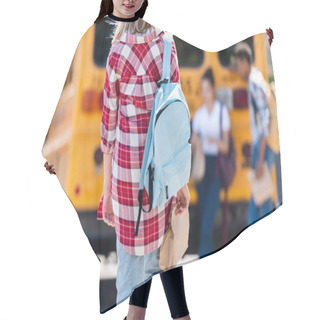 Personality  Rear View Of Teen Schoolgirl Walking To Classmates Leaning On School Bus Hair Cutting Cape